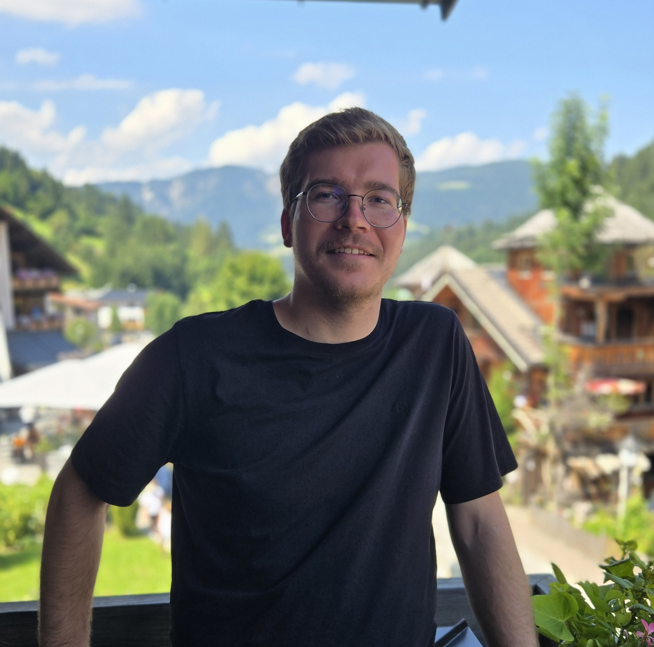 Tobias Seeanner outdoors with mountains in the background